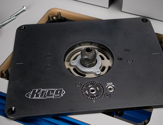 Mount your router with a predrilled or undrilled insert plate