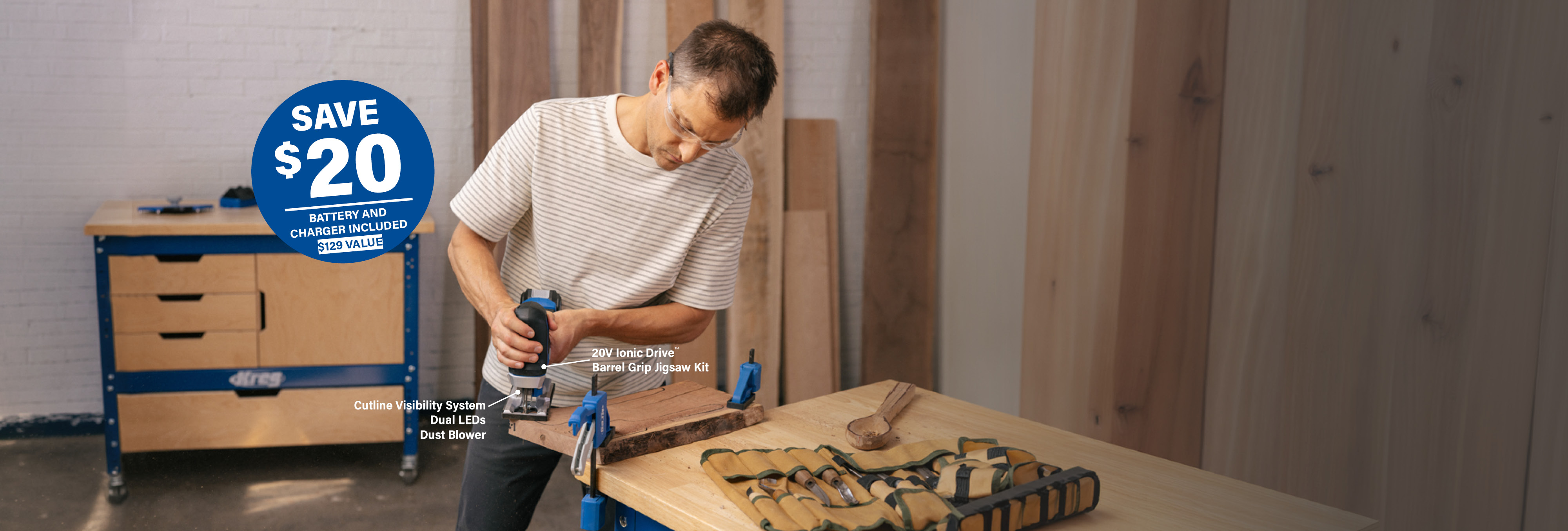 A man uses a jigsaw to cut out a slab of wood on his workbench, using the Kreg Ionic Drive Jigsaw. A burst calls out $20 savings on the tool.