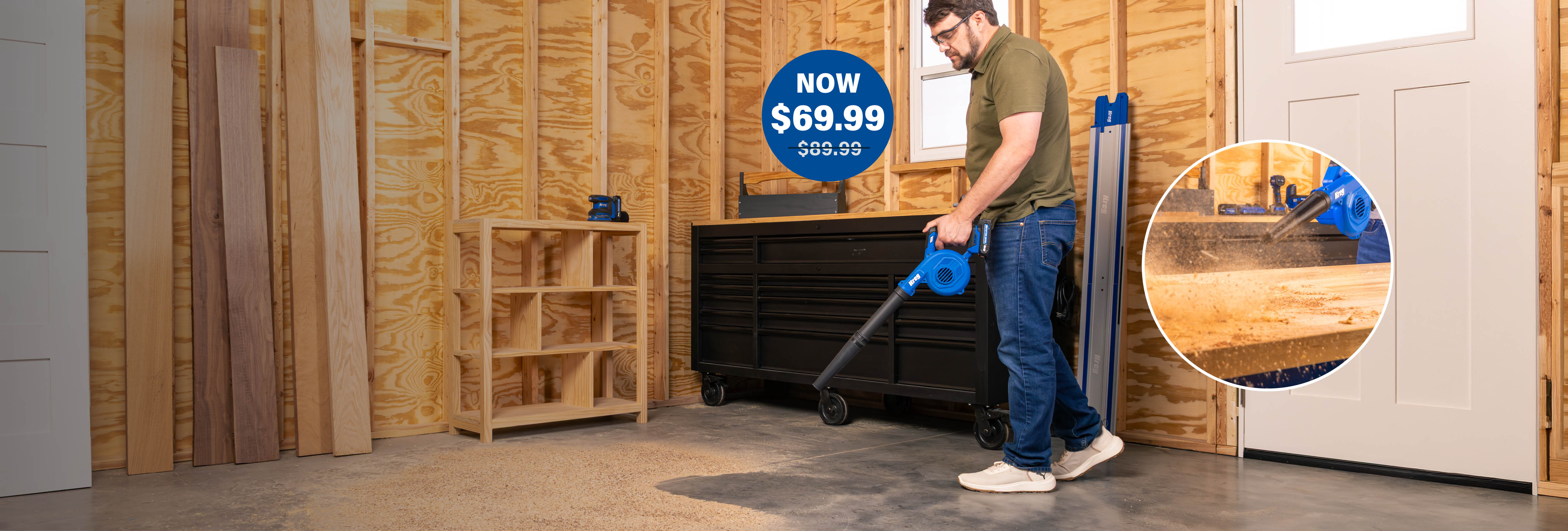 A man uses a shop blower to clean up his shop, while a burst on the page calls out a new $69.99 price point, down from $89.99.
